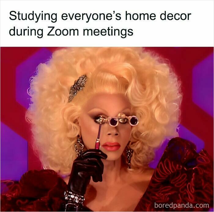 Person with big blonde hair and glamorous makeup using mini binoculars to study home decor during Zoom meeting, funny WFH meme.