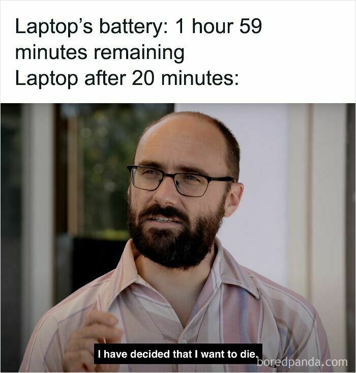 Man with glasses and beard making a frustrated face with caption about laptop battery drain in funny WFH memes.