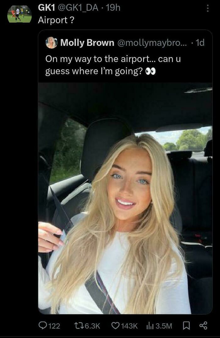 Young woman with long blonde hair smiling in a car seatbelt selfie, part of internet responses that hit hard collection.