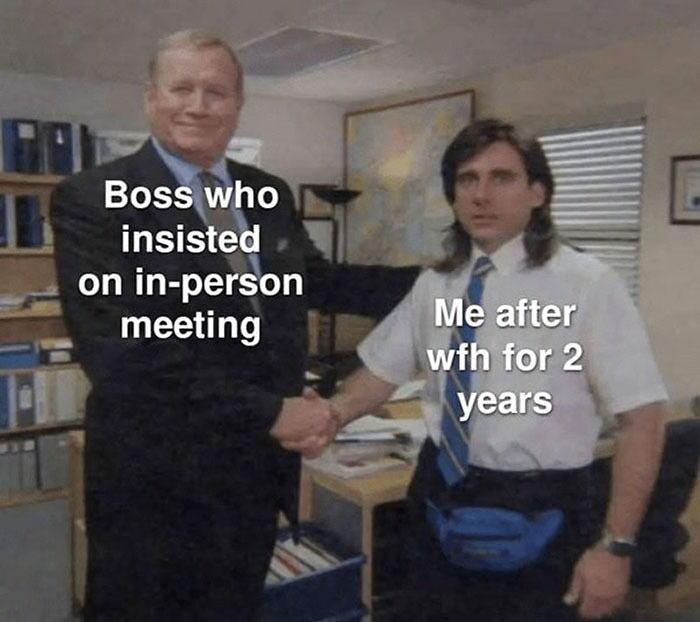 Two men shaking hands in an office, depicting the humor of funny WFH memes about remote work and casual dress after two years.