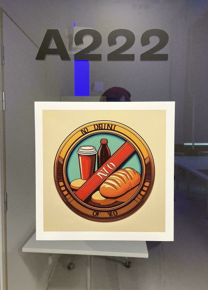Room A222 glass door with a visible no food or drink sign, highlighting unusual school rules and conditions.
