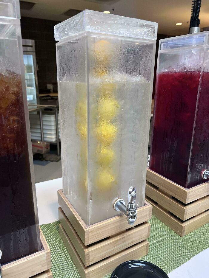 Clear beverage dispenser with lemons inside, part of a school drink station showing how not all schools are created equal