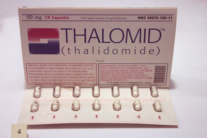 Thalidomide capsules from past medical devices highlighting dangers that make you appreciate modern medicine advancements.