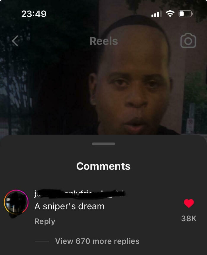 Man reacting in a social media clip with a popular internet response comment, highlighting viral internet responses.