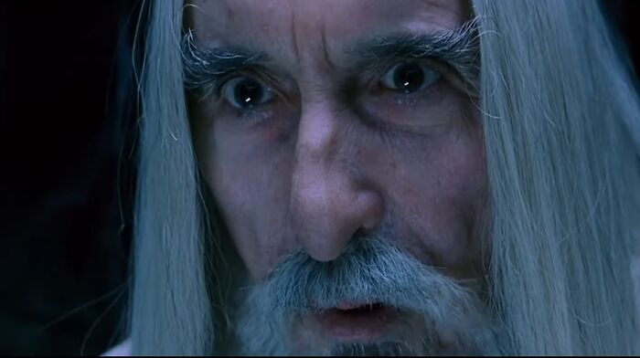 Close-up of an older man with long white hair and beard portraying an iconic villain in a dramatic scene for actors who auditioned for heroes.