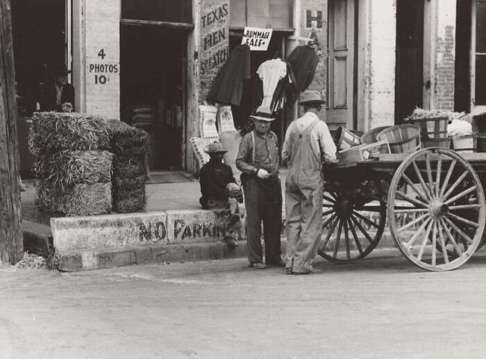 Two men in overalls by a horse-drawn cart outside a store during the Great Depression rare era photo.