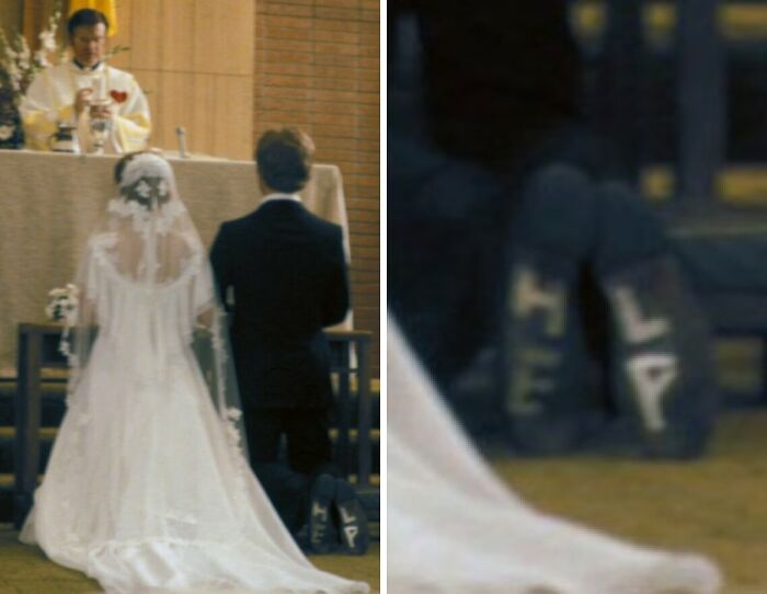 Bride and groom kneeling at altar, groom wearing boots with the words help on soles, showing entitlement at wedding.