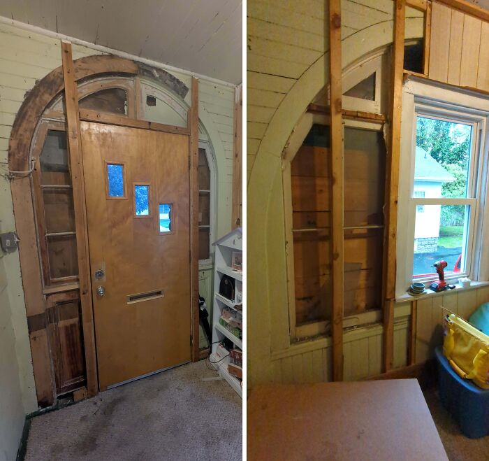 Old wooden door and hidden wall space revealed during home renovation, showing unexpected architectural features under floorboards.