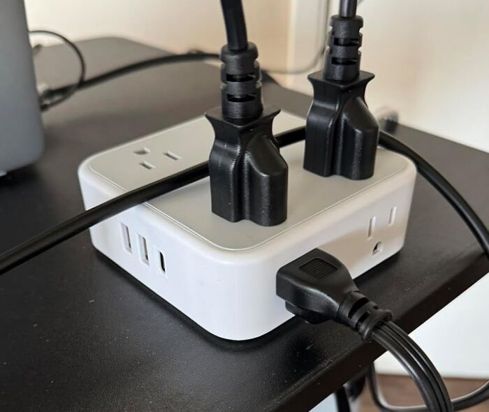 Power strip with multiple plugs connected, highlighting essential best sellers that topped the charts this past Prime Day.