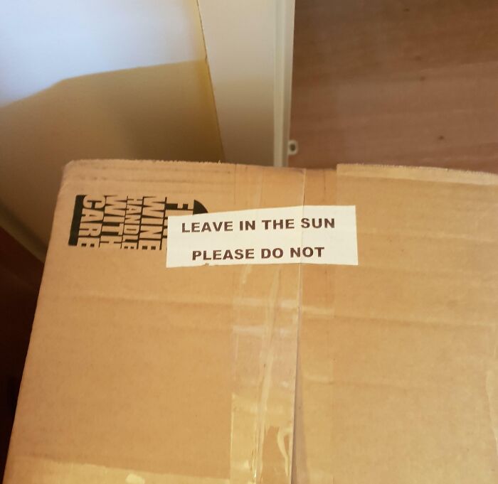 Cardboard delivery package with conflicting label instructions about sun exposure, illustrating times deliveries went off track.