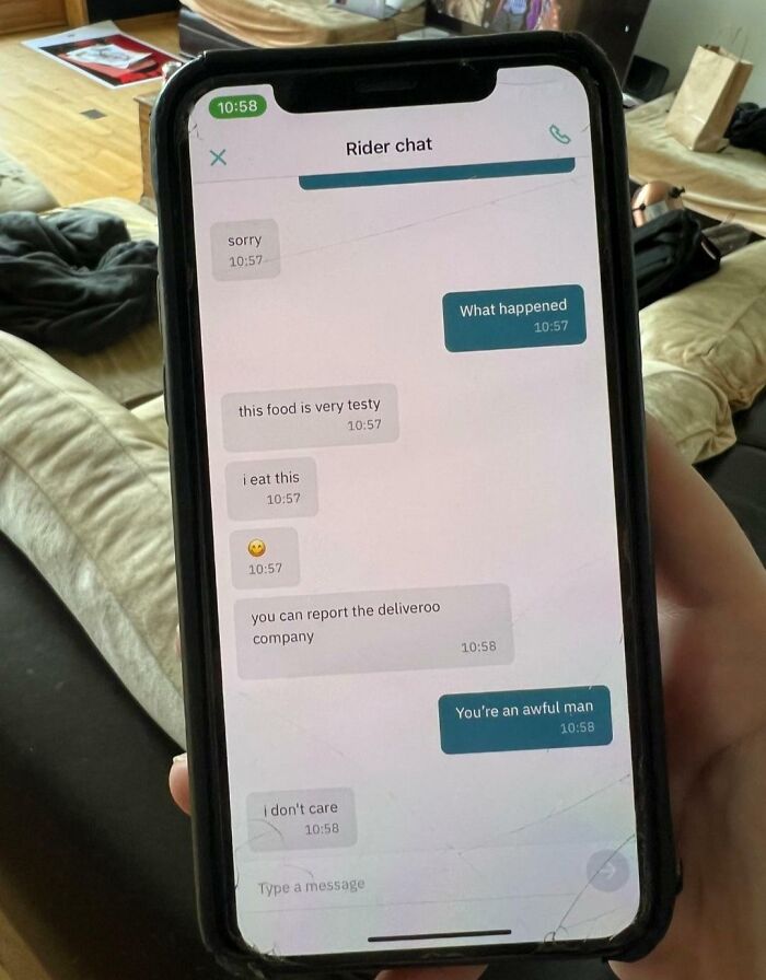 Chat screen on a phone showing a delivery rider admitting to eating the food, illustrating delivery mistakes and problems.