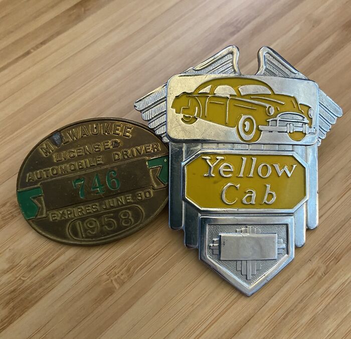 Vintage 1950s driver license badge and yellow cab emblem showcasing life in the 1950s through authentic memorabilia.
