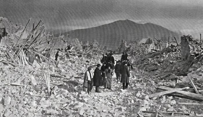 Victims and rescuers navigate through rubble after one of the largest natural disasters from the last century.
