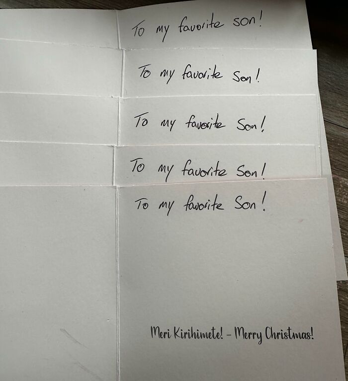 Five handwritten cards each saying To my favorite son from a hilarious dad nailing fatherhood with a Christmas message inside