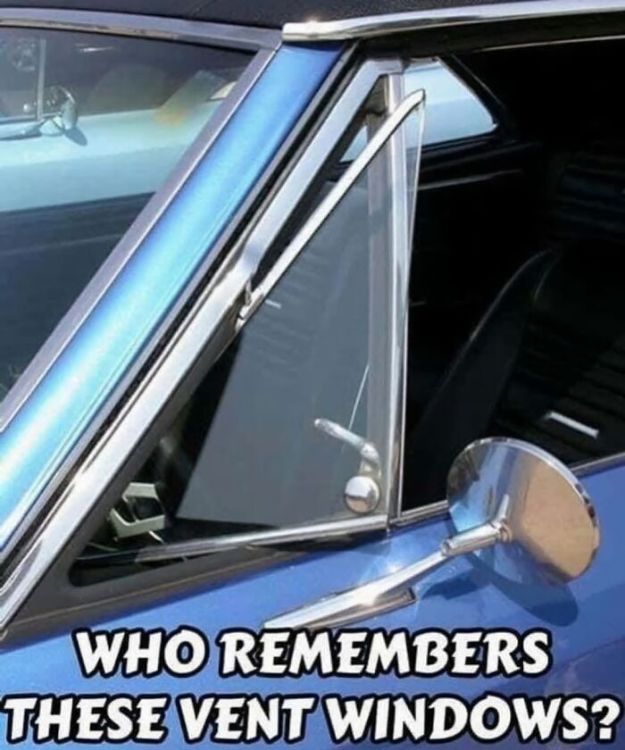Close-up of blue vintage car vent window and side mirror, evoking nostalgia for the good old days of the 80s.