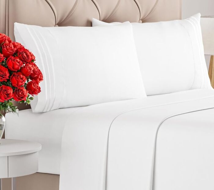 White bed sheets and pillows neatly arranged on a bed, one of the most-wished-for Amazon finds in home essentials.