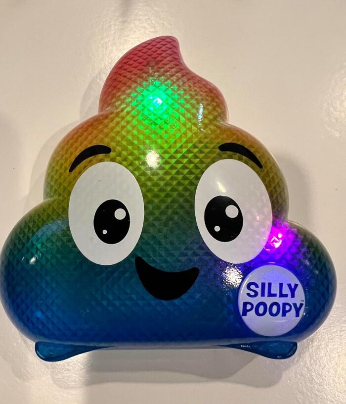 Colorful smiling p**p emoji toy with textured surface and LED lights, a fun toy under $20 gift idea.