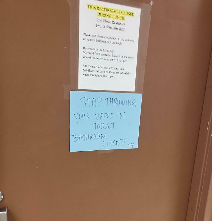 Bathroom door in a school with handwritten sign about vaping and restroom closure, showing how not all schools are created equal.