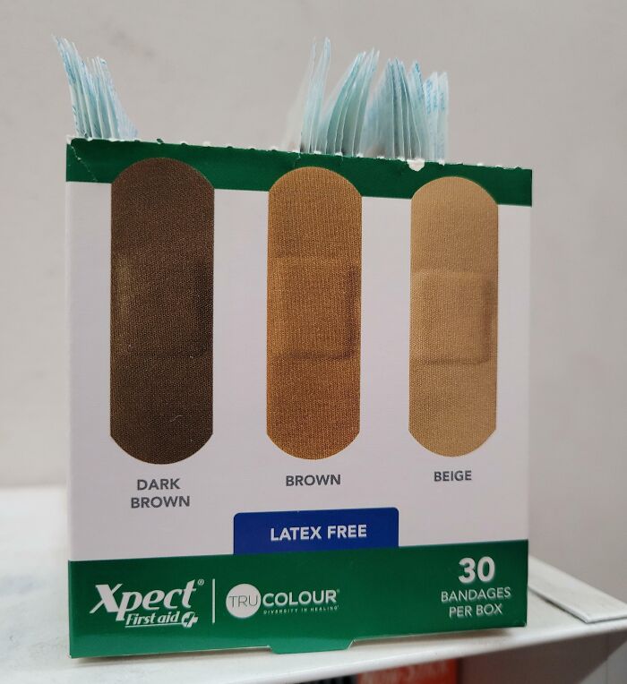 Box of latex-free bandages in dark brown, brown, and beige shades offering genius solutions to overlooked problems.