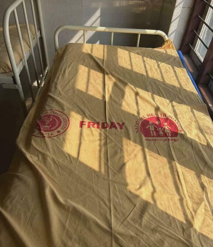 Hospital bed with a yellow sheet labeled Friday, showcasing a practical solution for organizing weekly healthcare tasks.