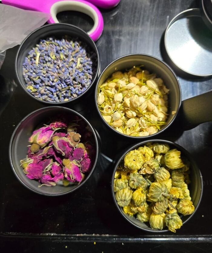 Containers with dried flowers and herbs for crafting, a creative hobby to trade screen time for skill time.