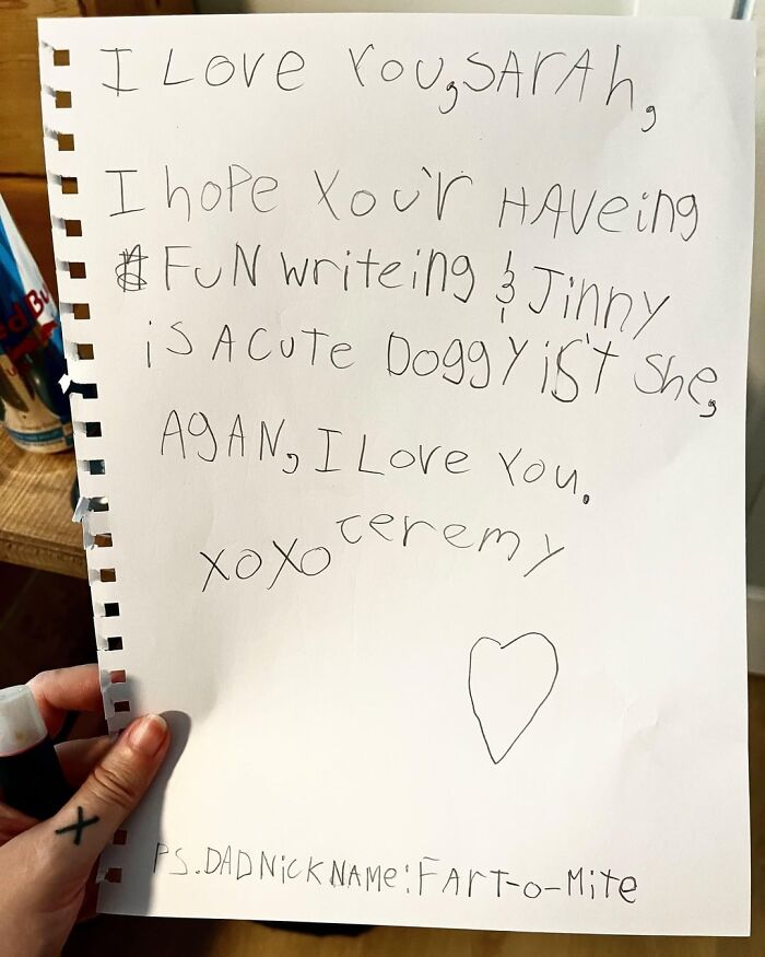 Handwritten note on white paper showing wholesome love and innocence, capturing the beauty of planet earth in simple words.