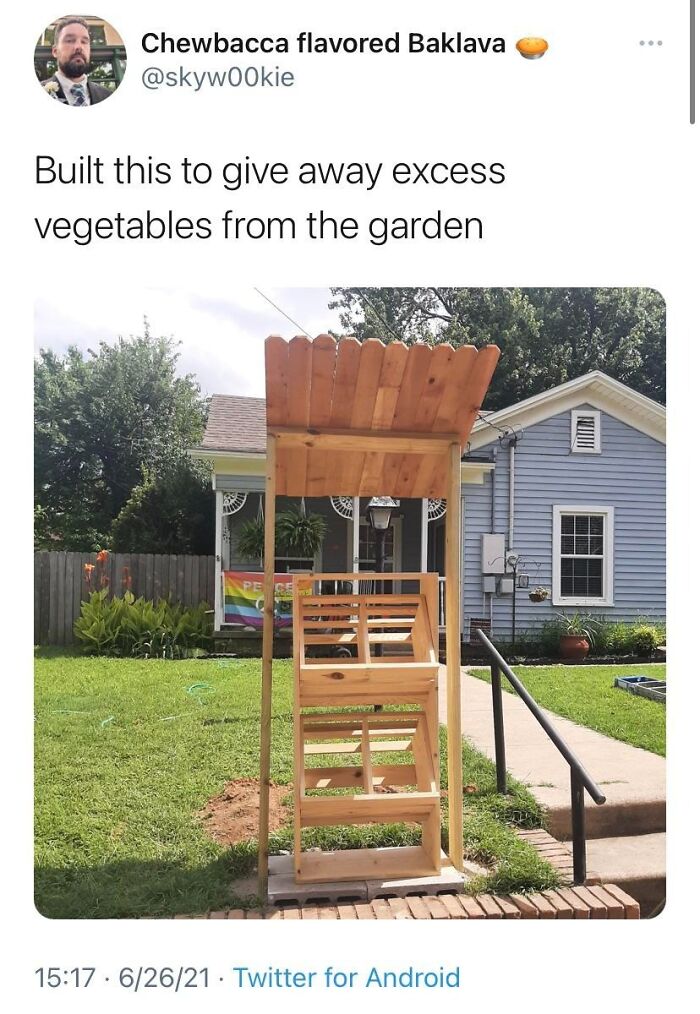 Wooden stand built outdoors to share excess vegetables from the garden showcasing the beauty of planet Earth.