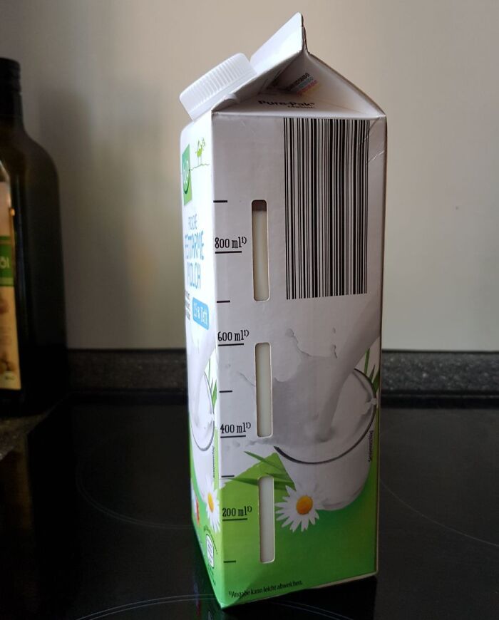 Carton with a creative measuring window for liquid levels, showcasing a genius solution to an overlooked packaging problem.