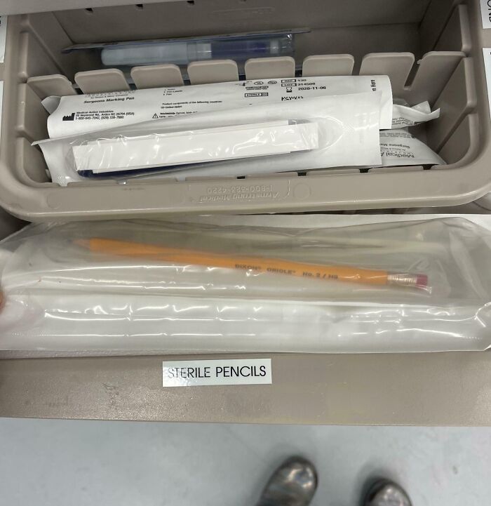 Sterile pencils and medical tools in packaging, showcasing organized medical supplies for clinical use.
