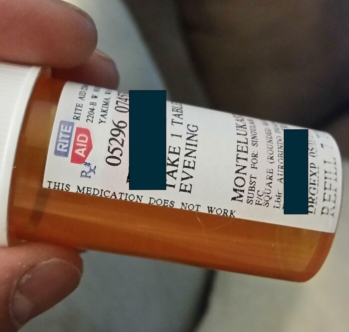 Hand holding a prescription pill bottle labeled Monteleukast, showing medication details and dosage instructions.