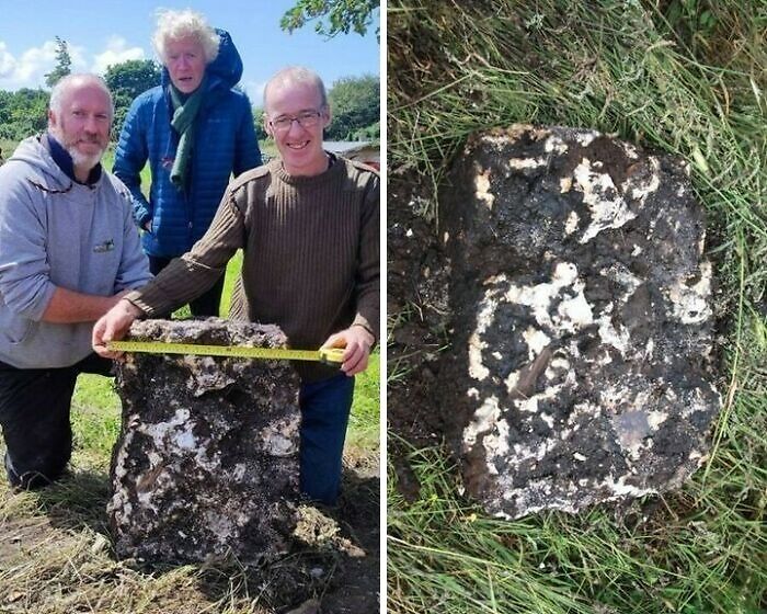 Three men outdoors measuring and examining an unusual large soil-covered object for interesting facts and discoveries.