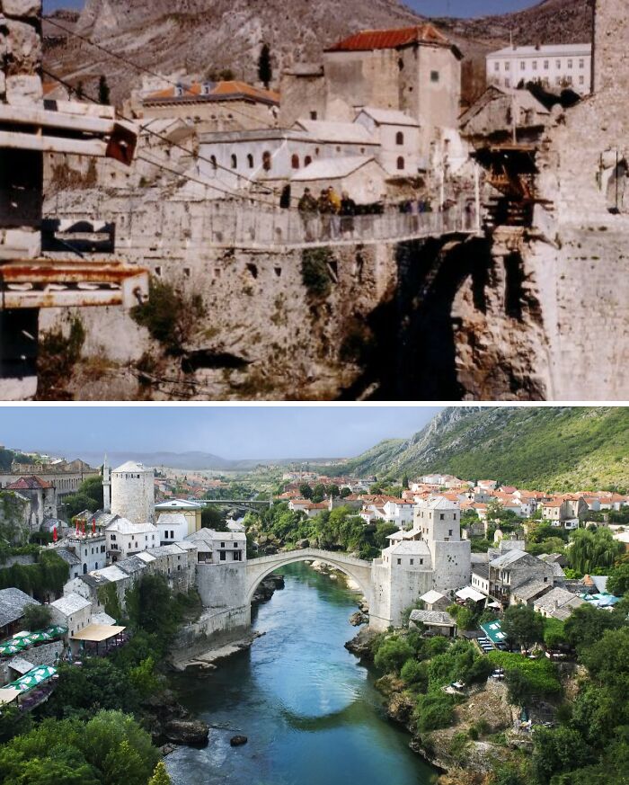 Historic buildings showing the restoration of a famous stone bridge and surrounding architecture by a river in a mountainous area.
