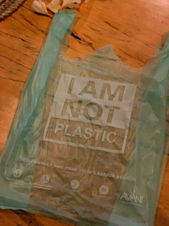 Eco-friendly bag made from cassava starch with I AM NOT PLASTIC message showcasing small genius things some countries do for sustainability