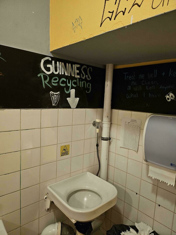 A creative recycling solution in a bathroom promoting genius things some countries do for sustainability.
