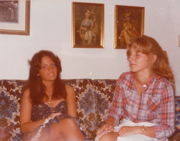 Two women in Florida in the 1970s sitting on a patterned couch, representing women breaking barriers in the era.