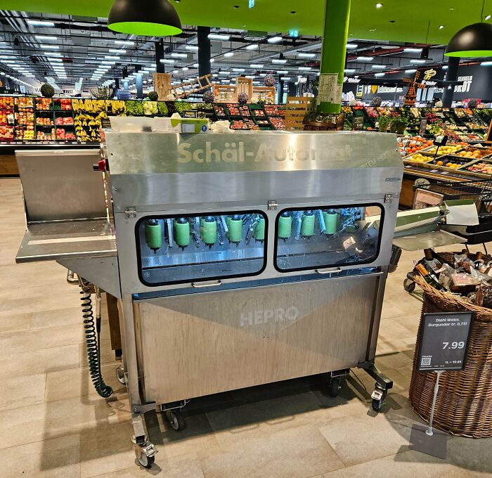 Peeling machine in a grocery store showcasing small but genius things some countries do for convenience.