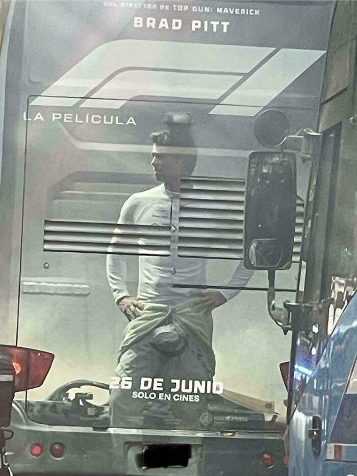 Man's body image distorted by bus vent on movie poster, illustrating an unattainable body portrayed in advertising fail.