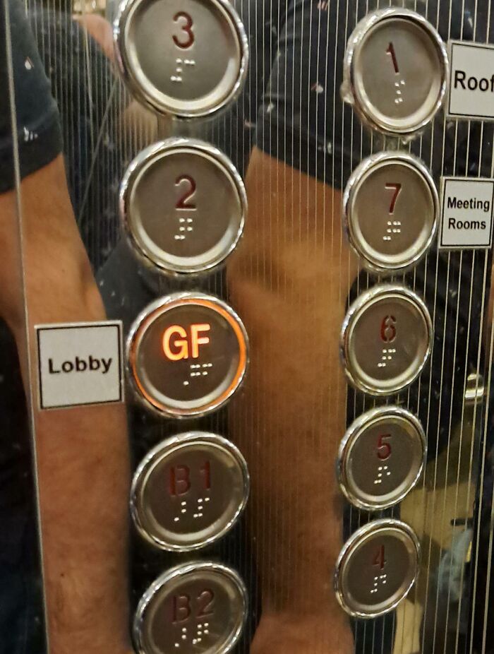 Hotel elevator panel with confusing floor buttons including ground floor labeled GF causing hotel mess-up frustration online.