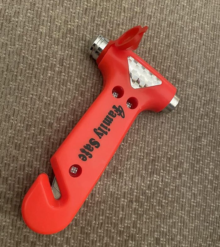 Red emergency safety hammer with reflective strip and blade for quick escape, highlighting safety nightmares fixes.