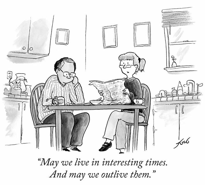 One-panel comic by Tom Toro shows a couple at breakfast with a caption about living in interesting times.