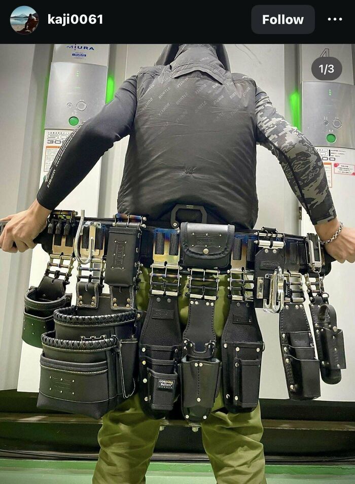 Person wearing an extensive multi-tool belt with various pouches and holders, one of the fascinating things people saw.