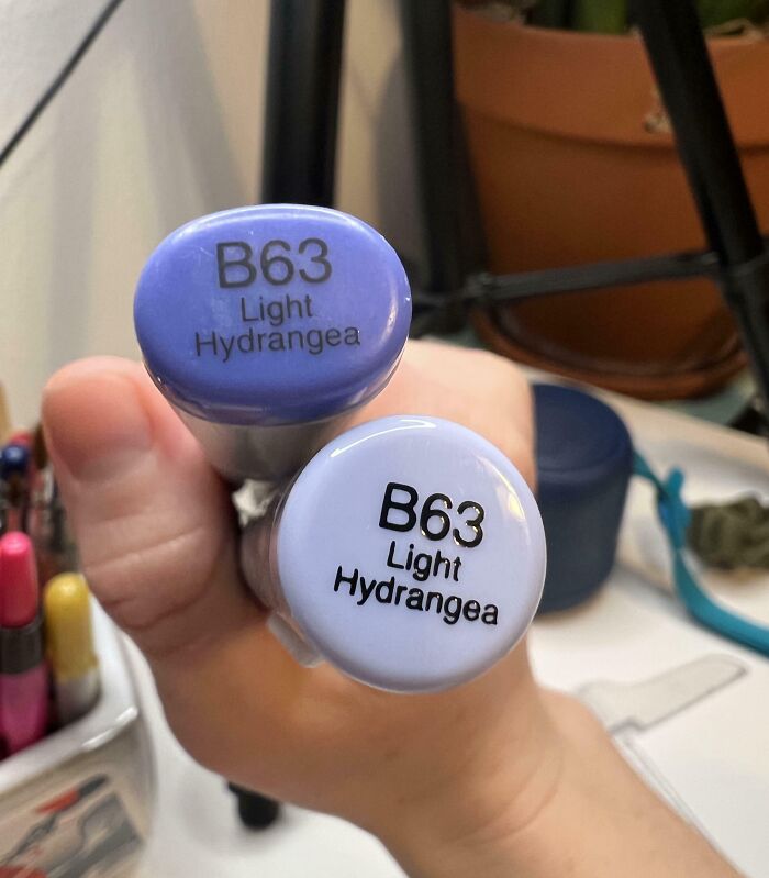 Two markers labeled B63 Light Hydrangea in slightly different shades, highlighting imperfections that annoy people with OCD.
