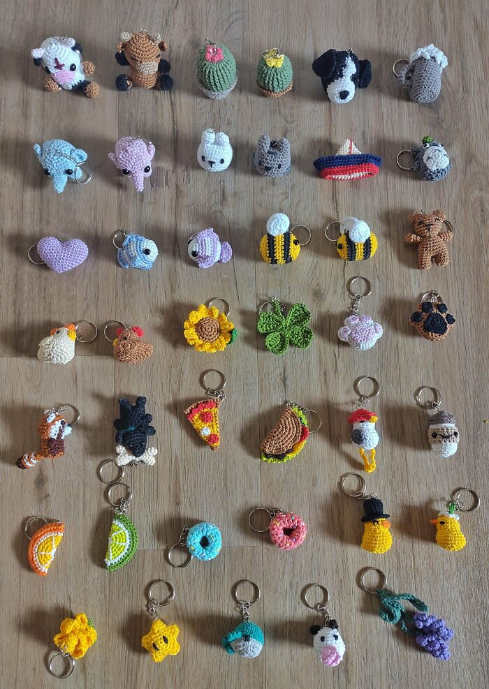 Crochet enthusiasts made incredible keychains featuring animals, plants, food, and more, showcasing detailed handmade crafts.