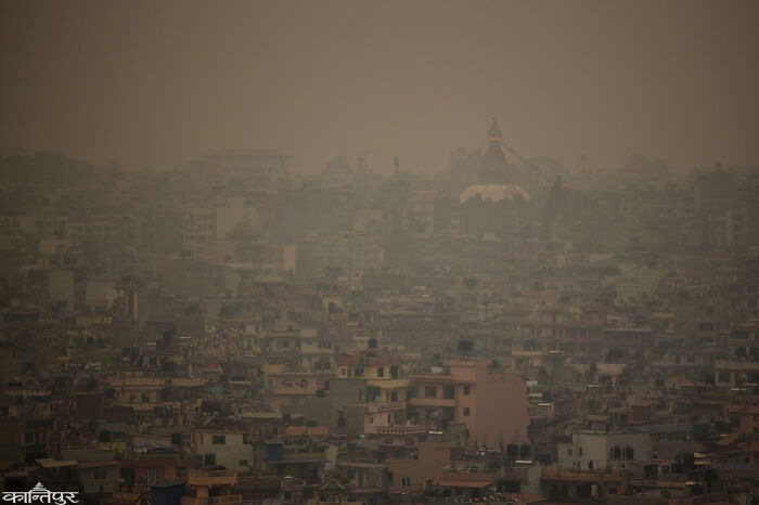 Dense urban cityscape under heavy smog, illustrating pollution and challenges of modern life in a $58 billion ghost city.