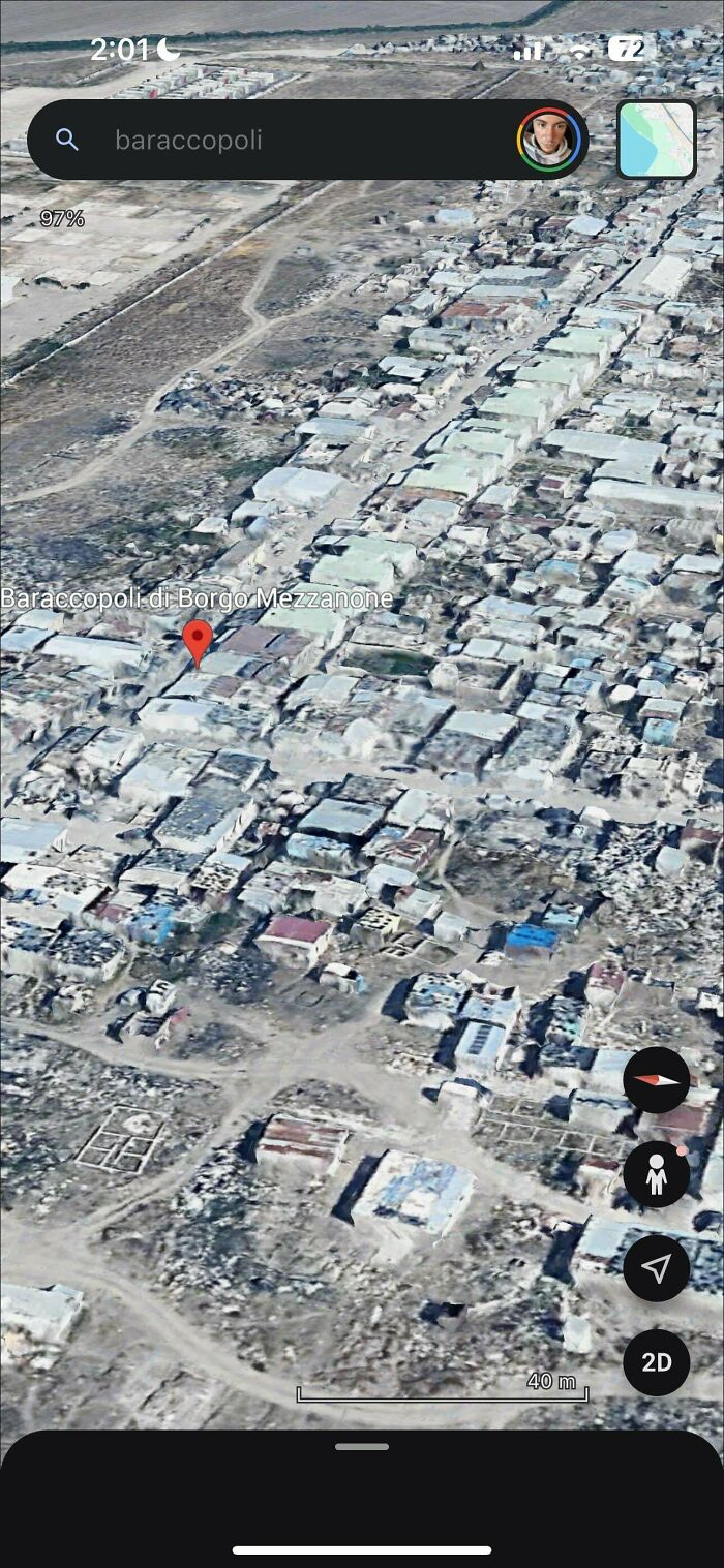 Aerial view of urban hell slum area showing densely packed and dilapidated buildings illustrating societal problems
