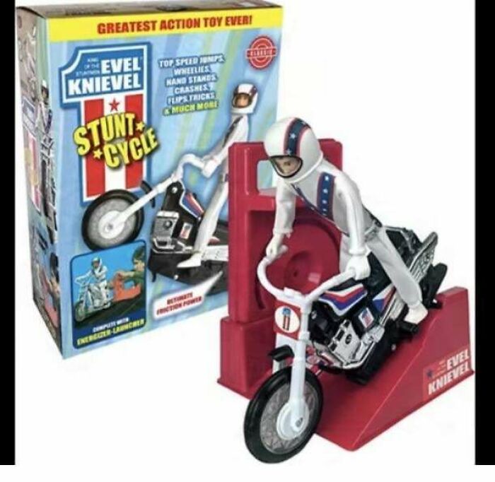 Evel Knievel stunt cycle toy from nostalgic collection, featuring action figure on motorcycle with launcher stand.