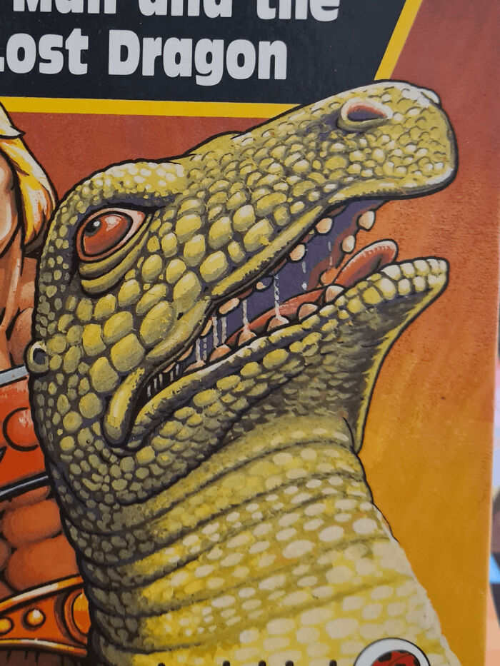 Close-up of an awkward dinosaur illustration on a book cover, showcasing humor in terrible book cover designs.