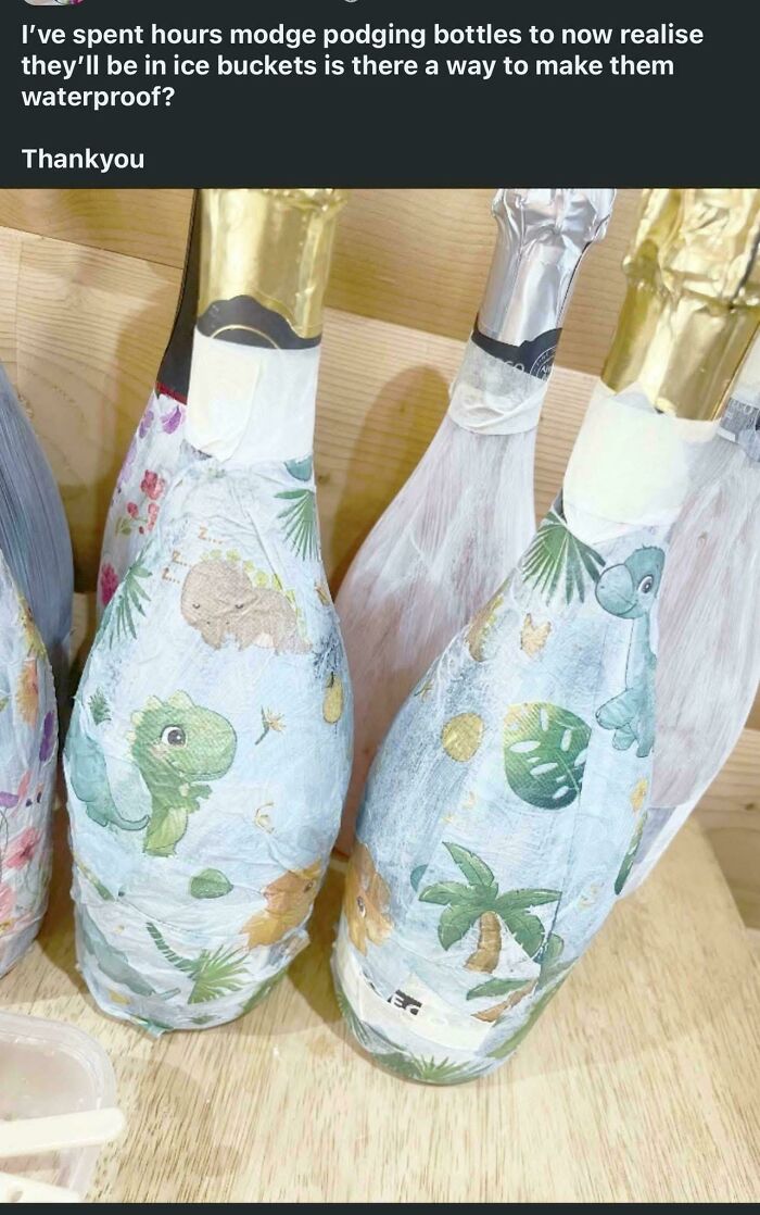 Champagne bottles decorated with cartoon dinosaur designs in a wedding moment that got mercilessly shamed online.