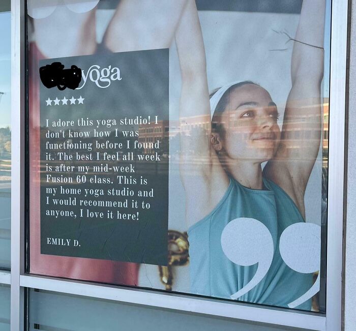 Yoga studio advertisement showing a woman stretching with an unattainable body portrayed in advertising fail.