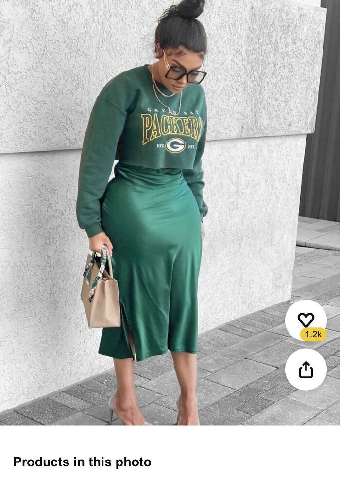 Woman wearing a Green Bay Packers sweatshirt and green skirt posing outdoors in stylish outfit for Instagram vs reality pics.